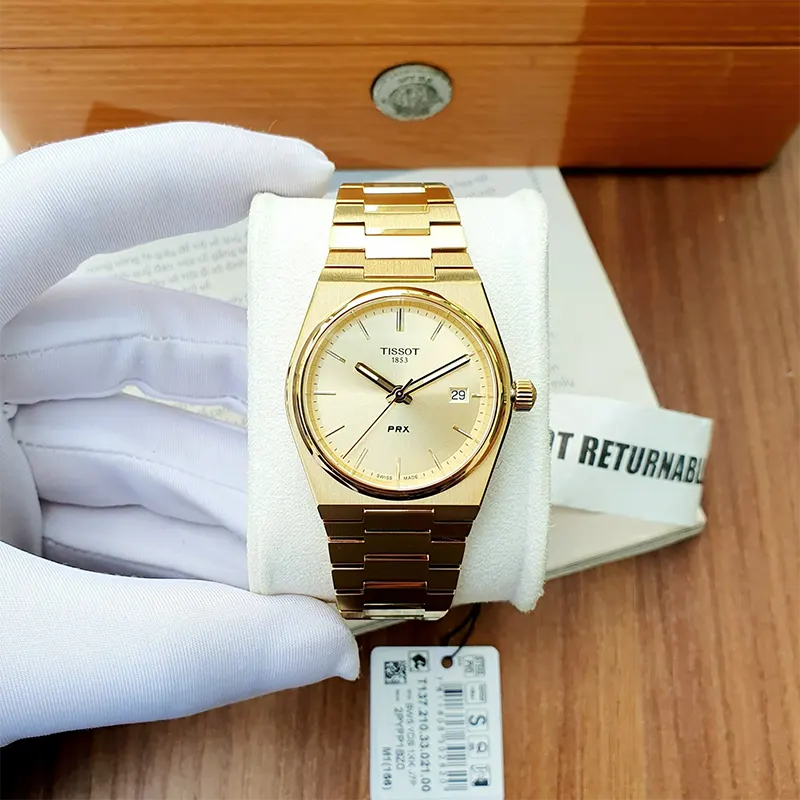 Tissot PRX 35mm Champagne Dial Gold-tone Unisex Watch- T137.210.33.021.00